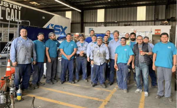 KY Trailer crew in work clothes smiling