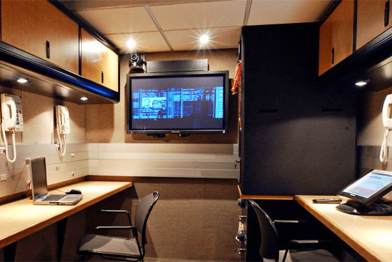 interior of the trailer with a tv