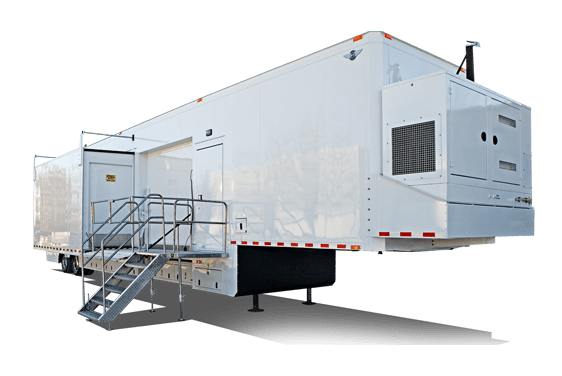 A white trailer with a set of stairs and a handrail is parked on a concrete surface.