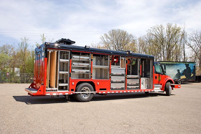 red and black exterior of an emergency response trailer