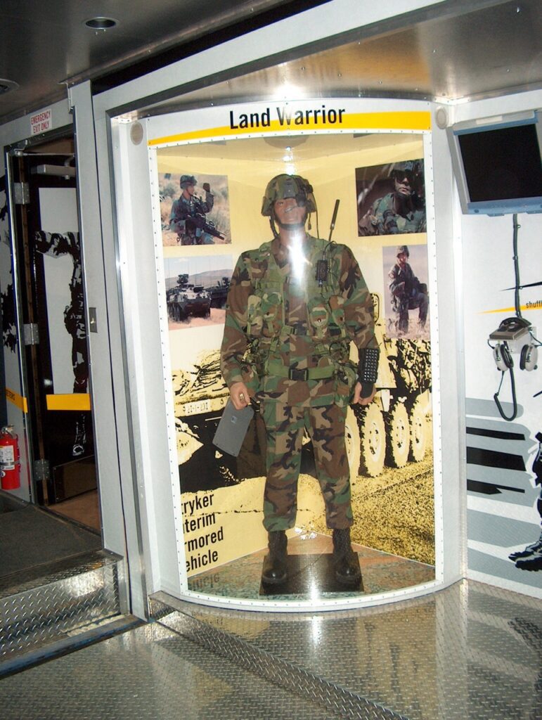 exhibits of military uniforms inside of the trailer