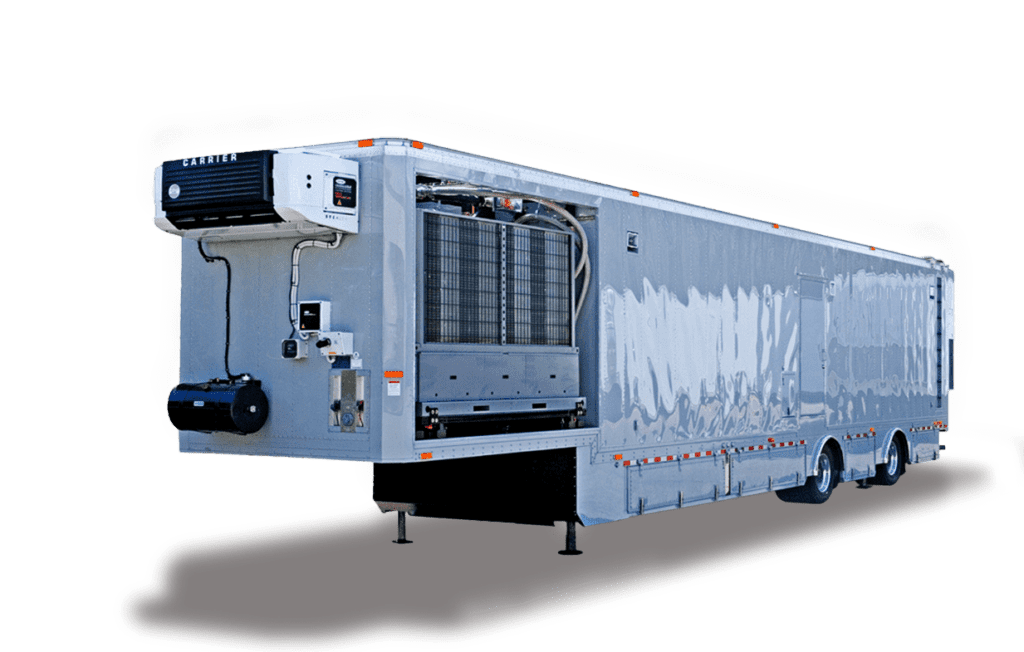 A large refrigerated trailer is shown isolated on a transparent background.