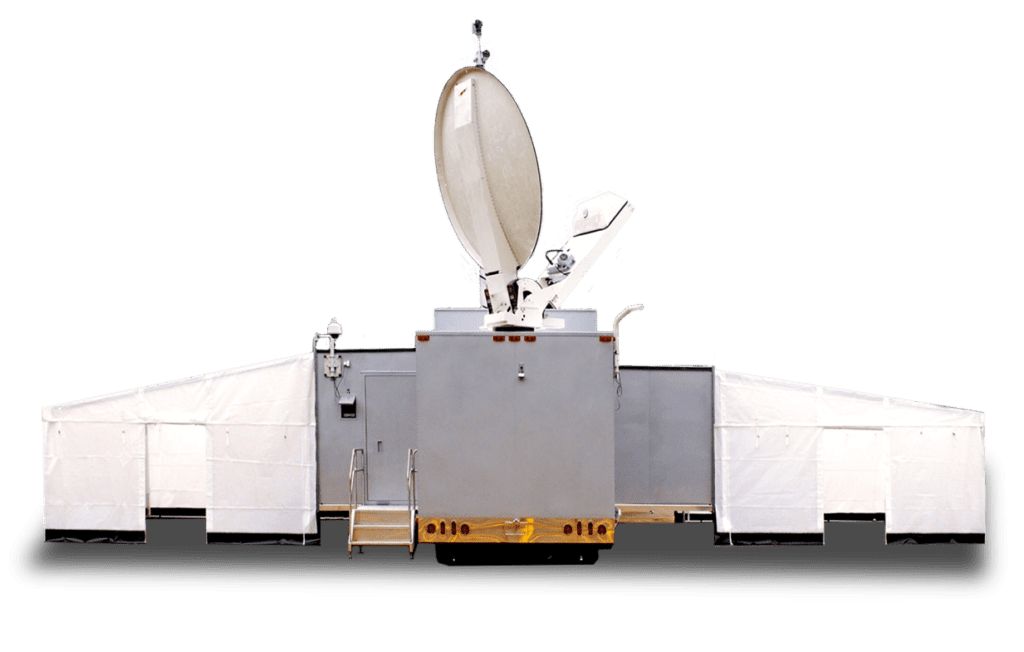 A large, white, rectangular vehicle with an open satellite dish on top and various panels on its sides is shown.